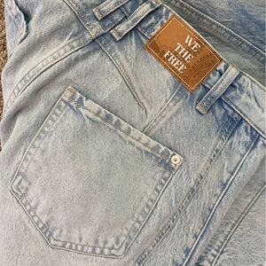 Free People mid rise barrel jean.